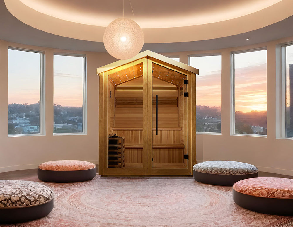 Golden Designs "Kaarina" 6 Person Outdoor Traditional Sauna in Canadian Red Cedar from Wish Rock Relaxation, placed in a circular sunset-view lounge.
