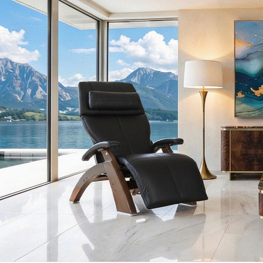 Human Touch Perfect Chair PC-420 Classic Manual Plus in black reclined in a modern living room with mountain lake view from Wish Rock Relaxation