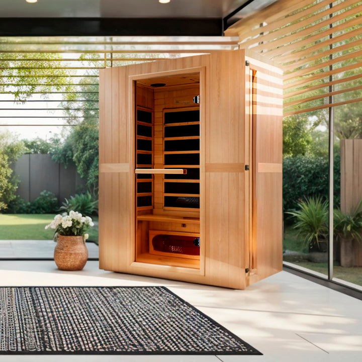 Maxxus “Serenity” Dual Tech 2-Person Low EMF FAR Infrared Sauna in Canadian Hemlock shown in a modern home spa setting, featuring interior infrared heaters, tempered glass door, and natural wood finish from Wish Rock Relaxation.