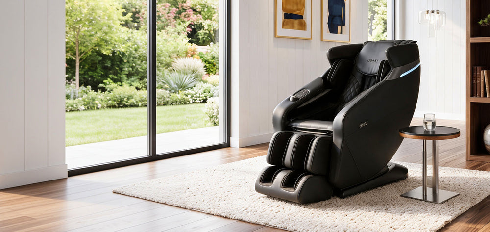 Titan Forma 3D+2D massage chair in black upholstery placed in a modern living room near a garden-view window from Wish Rock Relaxation
