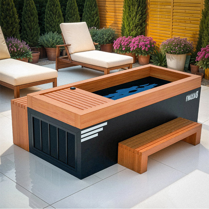 Medical Breakthrough Frozen 8 Cold Plunge with wood trim, integrated cooling system, and matching bench in luxury outdoor patio from Wish Rock Relaxation.